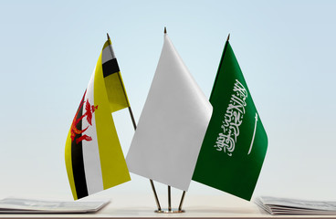  Flags of Brunei and Saudi Arabia with a white flag in the middle