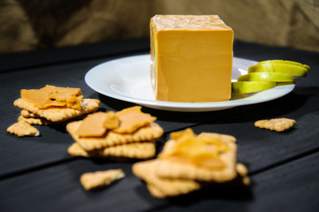 traditional scandinavian organic brown cheese brunost. Healthy Breakfast or snack. Healthy food and eating.