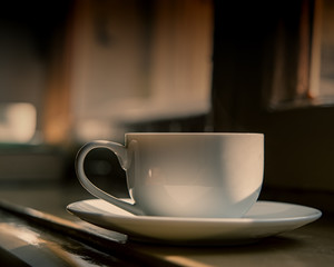 Cup of Coffee on the Window Sill.