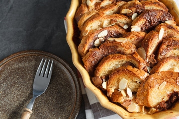 Homemade rustic bread pudding with chocolate and almonds