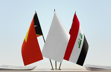  Flags of East Timor and Iraq with a white flag in the middle