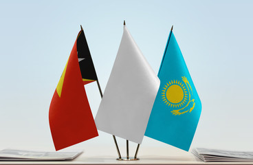  Flags of East Timor and Kazakhstan with a white flag in the middle