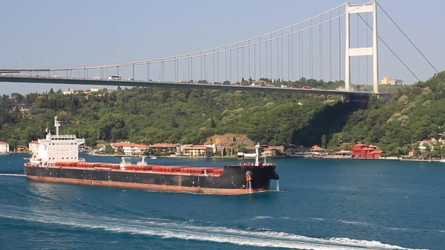Crude oil tanker ship sailing through Straits Bosporus in Istanbul.  A 274 mt long, 48 mt width vessel, has a deadweight of 150,581 tons. Super tanker full of oil sailing along the Bosphorus