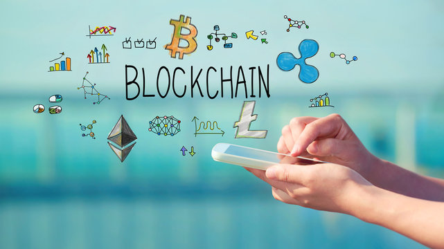 Blockchain concept with person holding a smartphone