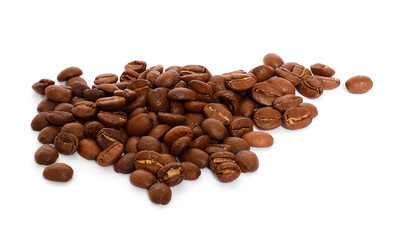 A lot of whole coffee grains isolated on white background.