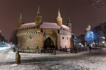 Obraz premium Krakow, Poland, Barbicane fortification in the winter night