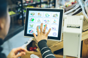 woman print price sticker for fruits