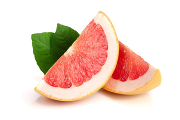 Grapefruit slices with leaves isolated on white background