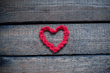 Hearts on a wooden old background. The concept for St. Valentine's Day