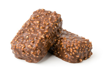 Chocolate candy with nuts on a white.