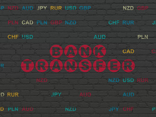 Money concept: Painted red text Bank Transfer on Black Brick wall background with Currency