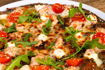 Pizza with salmon and mozzarella