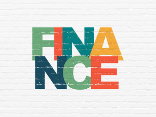Business concept: Painted multicolor text Finance on White Brick wall background