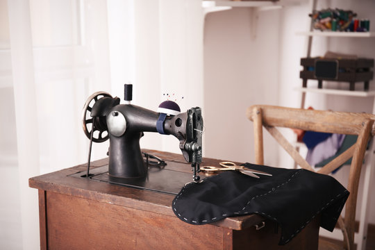 Tailor desk with old sewing machine