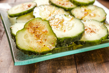 cucumber salad in rustic wood