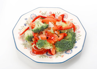 chopped vegetables on decorated plate