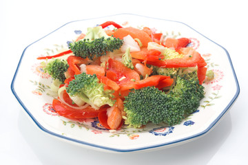 chopped vegetables on decorated plate