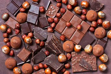 Chocolates Truffles  and pieces chocolate  on  dark background