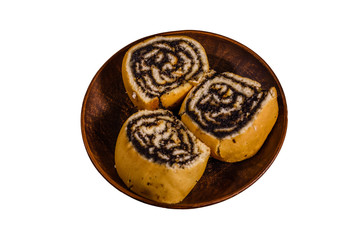 Ceramic plate with poppy seed buns isolated on a white background
