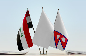Flags of Iraq and Nepal with a white flag in the middle