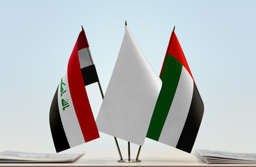 Flags of Iraq and UAE with a white flag in the middle