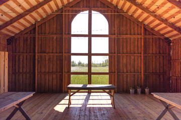 Fototapeta na wymiar Wooden barn hall for rustic wedding party