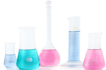 Chemical laboratory beakers with colorful liquids and reagents. Research science and medical laboratory.