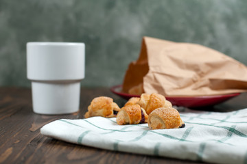 biscuits with berry stuffing on a dark wooden table