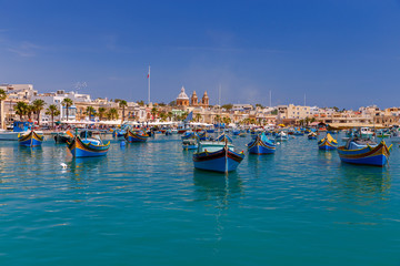 Fototapeta na wymiar Malta. Marsaxlokk. Traditional fishing boats.