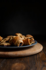 biscuits with berry stuffing on a dark wooden table