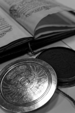 Old book with a seal.
