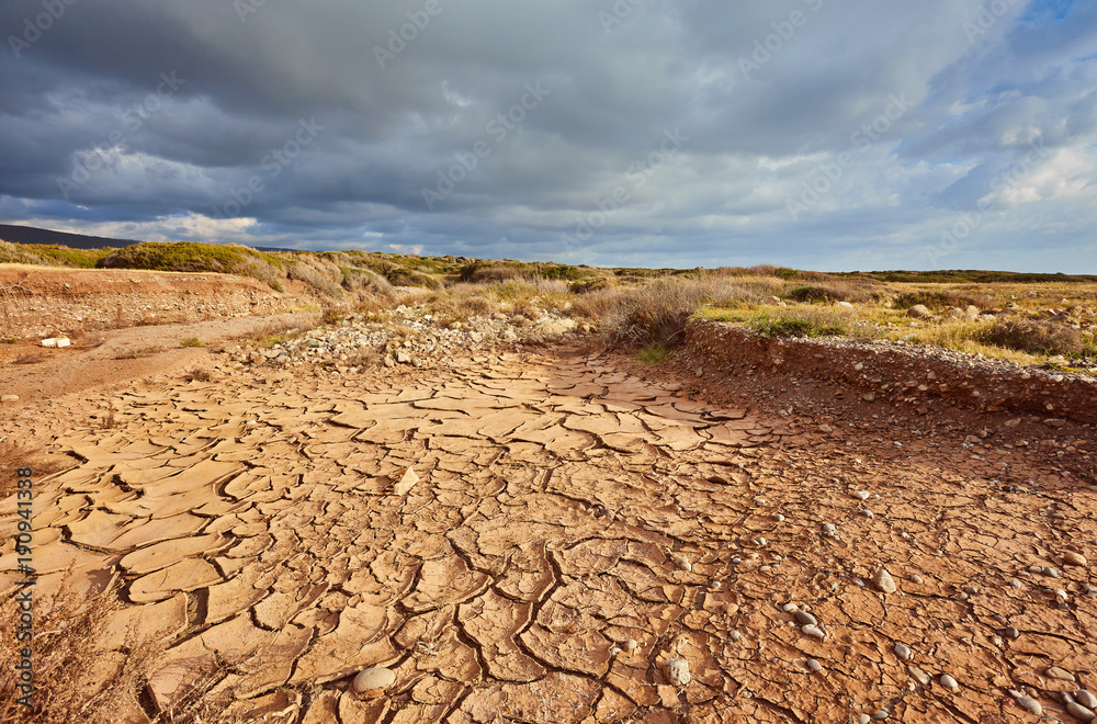 Poster global warming. deep blue sky over drought earth