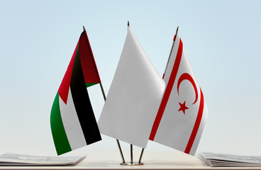 Flags of Jordan and Northern Cyprus with a white flag in the middle