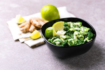 Traditional Indian cuisine. Homemade palak paneer. Copyspace, horizontal view