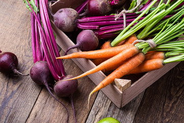 Crate with different fresh farm vegetables
