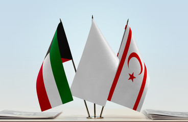 Flags of Kuwait and Northern Cyprus with a white flag in the middle