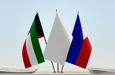 Flags of Kuwait and Philippines with a white flag in the middle