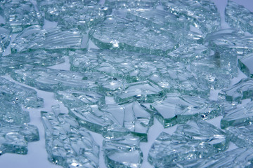 broken tempered glass closeup , background of glass was smashed