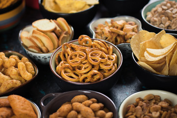 Salty snacks served in bowls