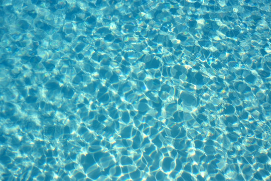 Swimming pool water surface abstract background photo