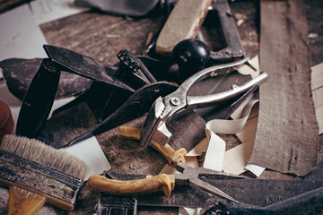 A set of old carpentry tools and a milling cutter for woodworking.