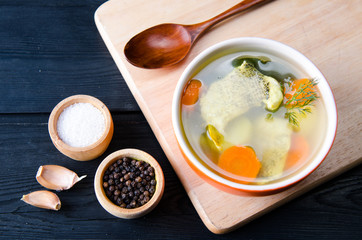 Fish soup served on the table in plate