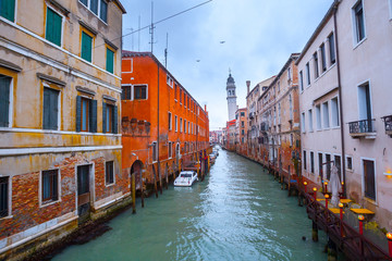 Wintertime of the rainy weather. Emerald water in the canals at low tide. Less known are not tourist destinations in the Castello-Arsenale. Venice. Italy.