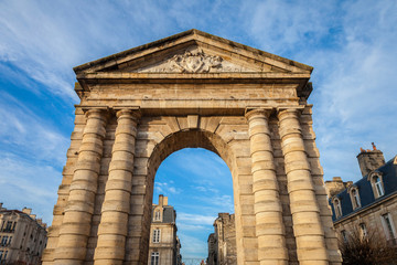 Fototapeta na wymiar Porte d'Aquitaine (Aquitaine Gate) with its symbolic arch on Place de la Victoire Square in Bordeaux, France. It is one of the landmarks of the old Bordeaux, and a former entrance to the city