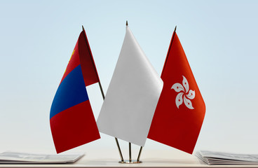 Flags of Mongolia and Hong Kong with a white flag in the middle