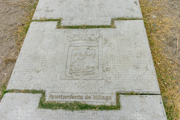 Inscription on a stone step at Malagueta beach in Malaga, Spain, Europe