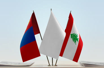 Flags of Mongolia and Lebanon with a white flag in the middle