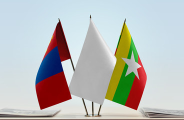 Flags of Mongolia and Myanmar with a white flag in the middle