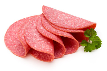Salami slices isolated on the white background.