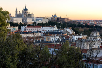 Obraz premium Sunset view of Royal Palace and Almudena Cathedral in City of Madrid, Spain